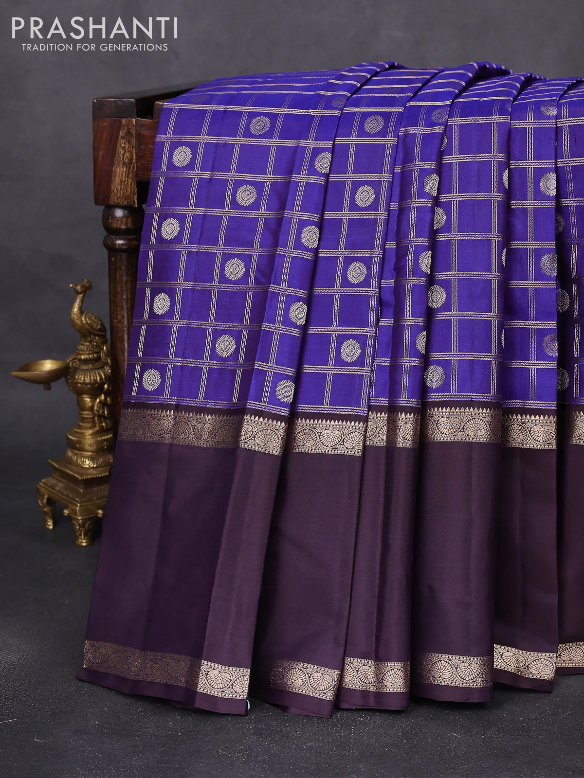 Pure kanchipuram silk saree blue and wine shade with allover zari checks & buttas and long rettapet zari woven border