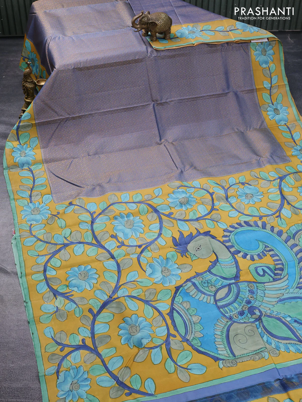 Pure kanchipuram silk saree blue shade and mustard yellow with allover zari woven geometric brocade weaves and kalamkari printed pallu & border - Image 2