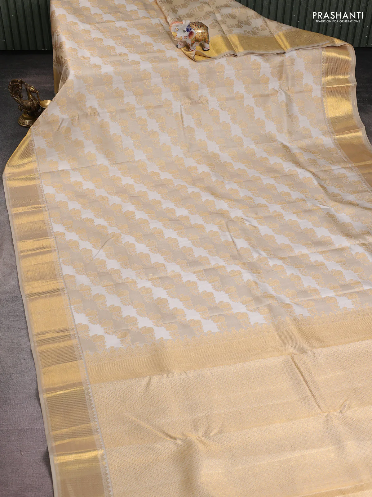 Pure kanchipuram silk saree cream and beige with allover zari woven brocade weaves and rich zari woven border - Image 2