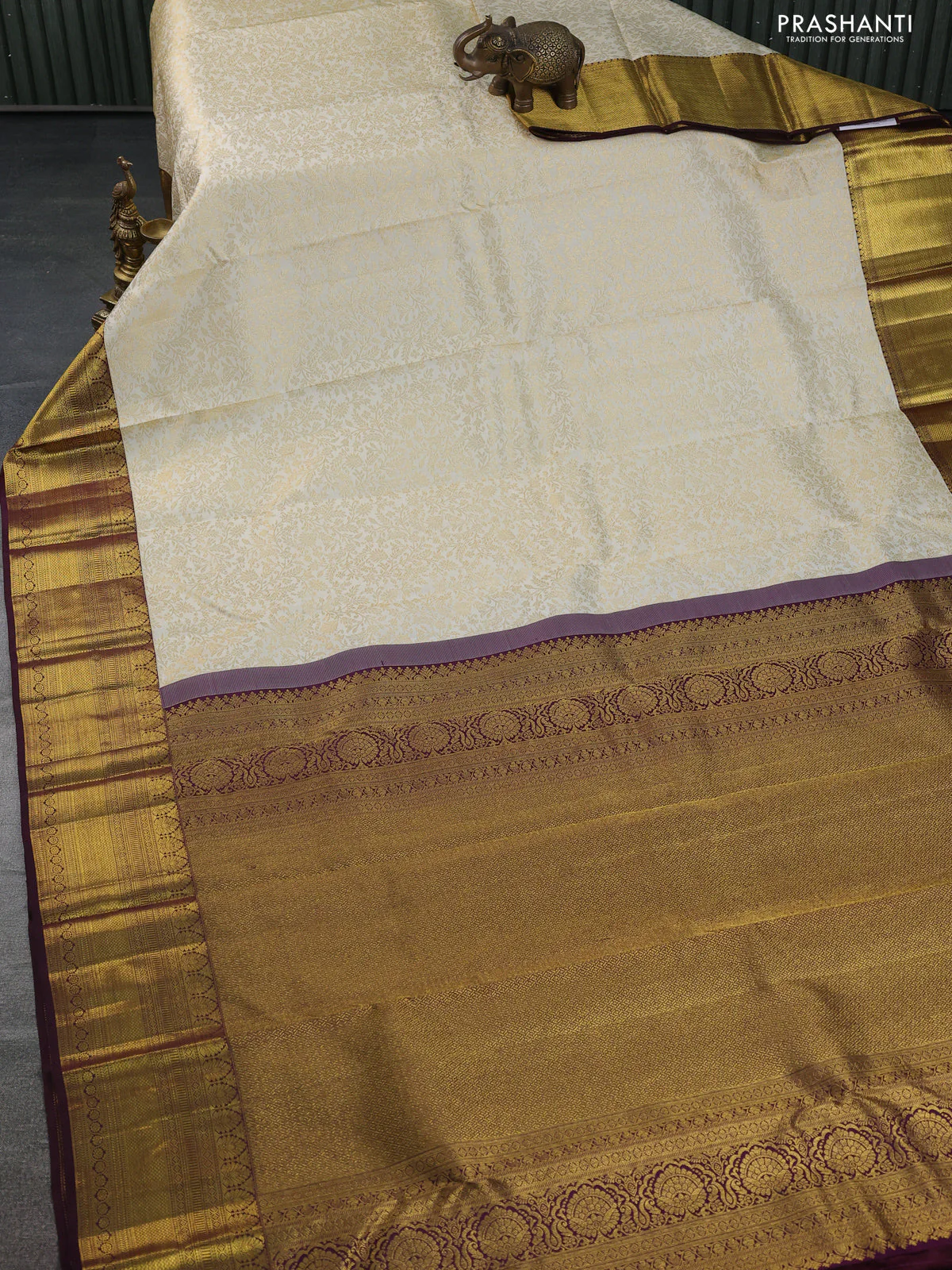 Pure kanchipuram silk saree cream and deep wine shade with allover zari woven brocade weaves and zari woven border - Image 2