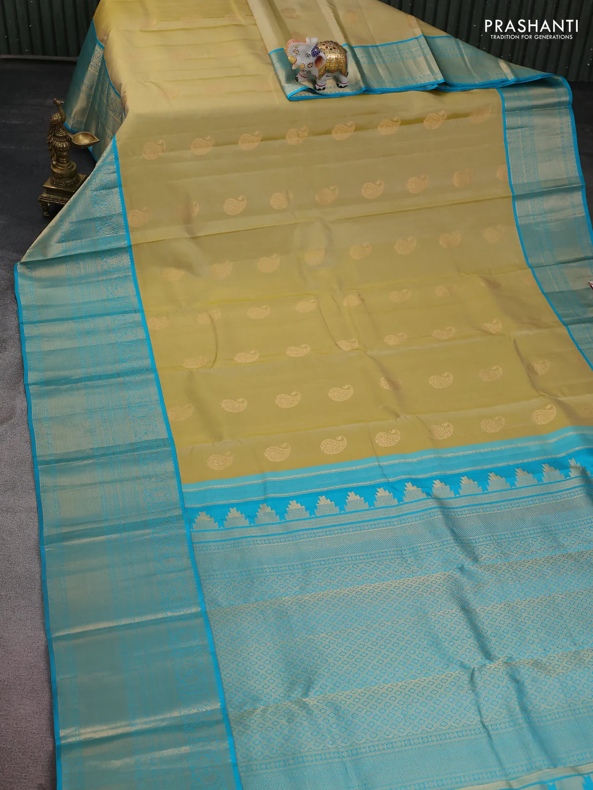 Pure kanchipuram silk saree cream and teal blue with paisley zari woven buttas and long annam zari woven korvai border - Image 2