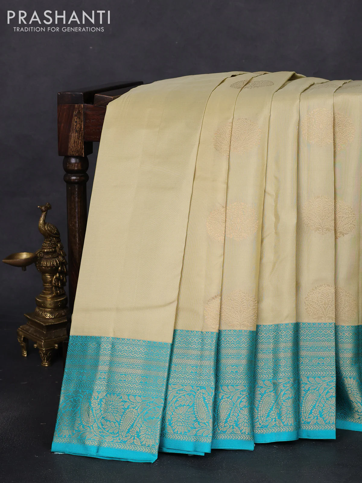 Pure kanchipuram silk saree cream and teal blue with zari woven buttas and zari woven korvai border