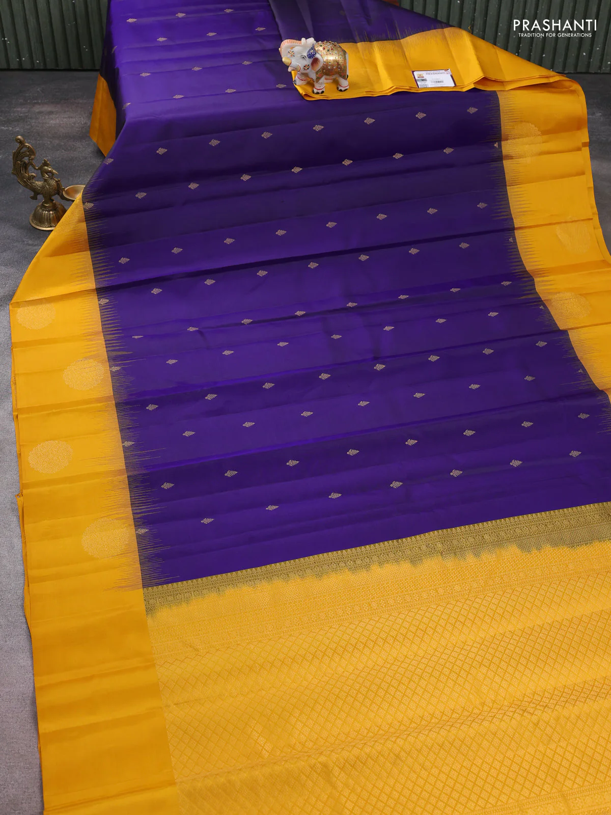Pure kanchipuram silk saree dark blue and mango yellow with zari woven buttas and zari woven butta border - Image 2