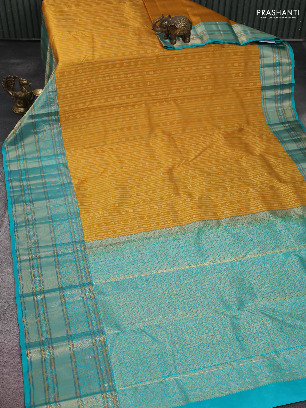 Pure kanchipuram silk saree dark mustard and teal blue with allover zari weaves and long zari woven korvai border - Image 2