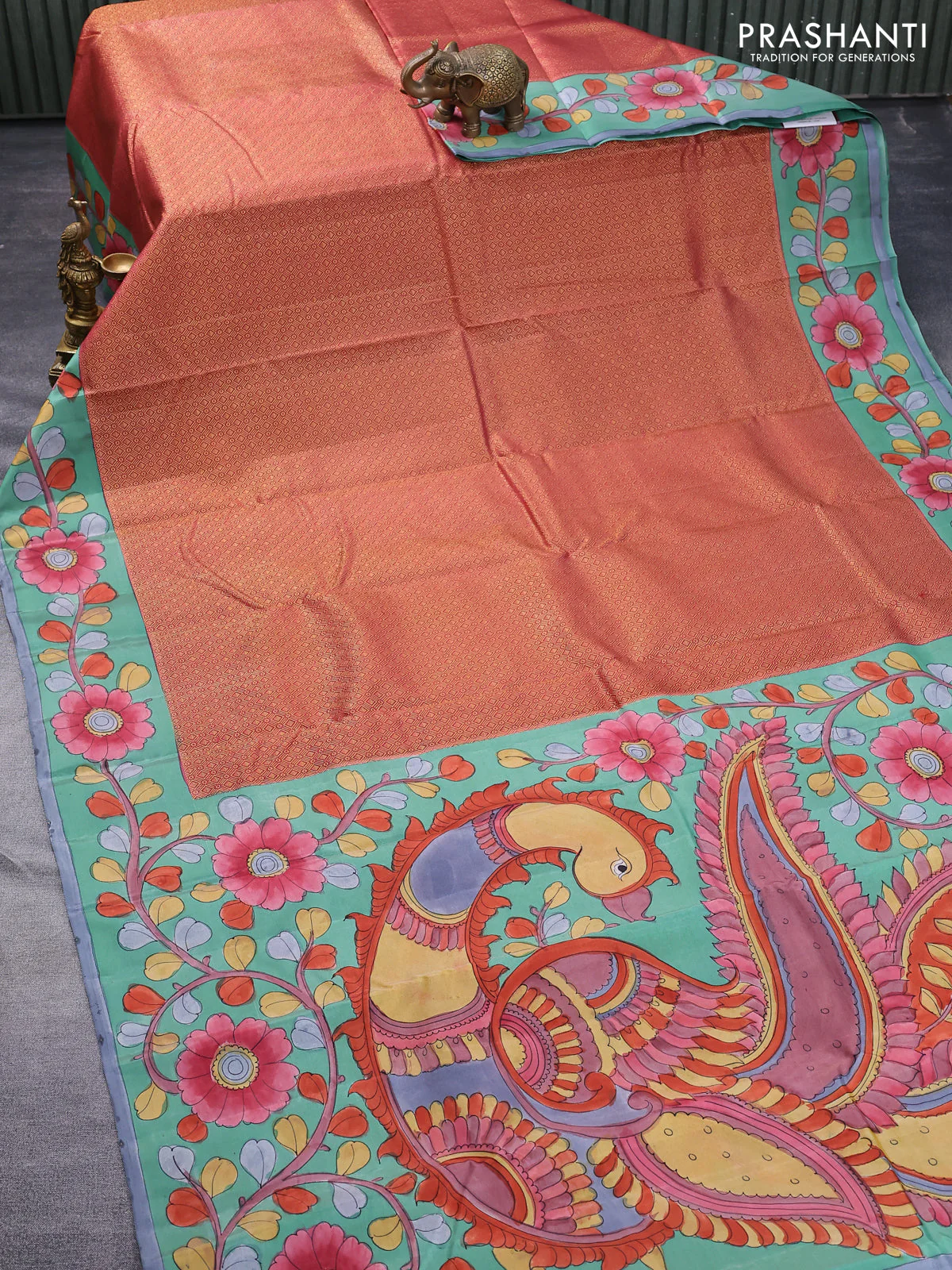 Pure kanchipuram silk saree dark peach shade and teal green shade with allover zari woven geometric brocade weaves and kalamkari printed pallu & border - Image 2