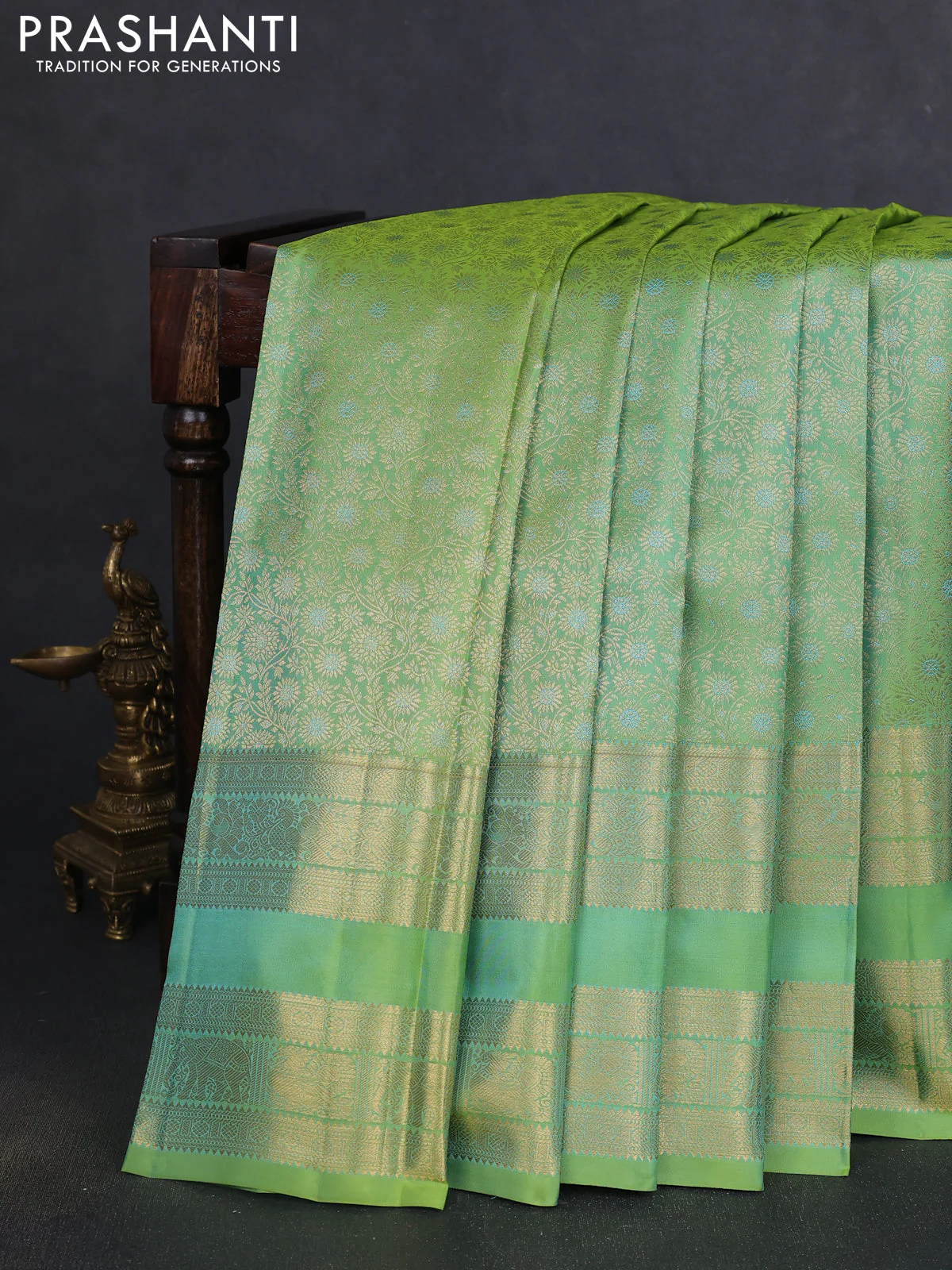 Pure kanchipuram silk saree dual shade of light green with allover zari woven brocade weaves and long rettapet zari woven border