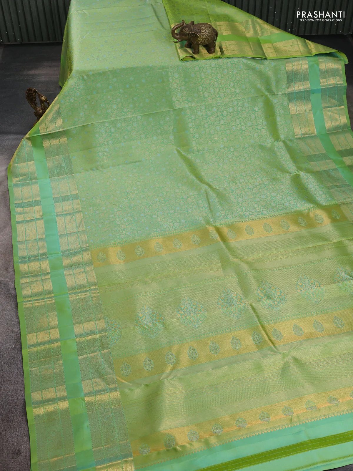 Pure kanchipuram silk saree dual shade of light green with allover zari woven brocade weaves and long rettapet zari woven border - Image 2