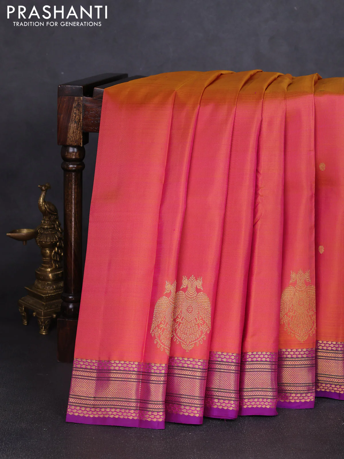 Pure kanchipuram silk saree dual shade of pinkish mustard and purple with zari woven buttas and rich zari woven border