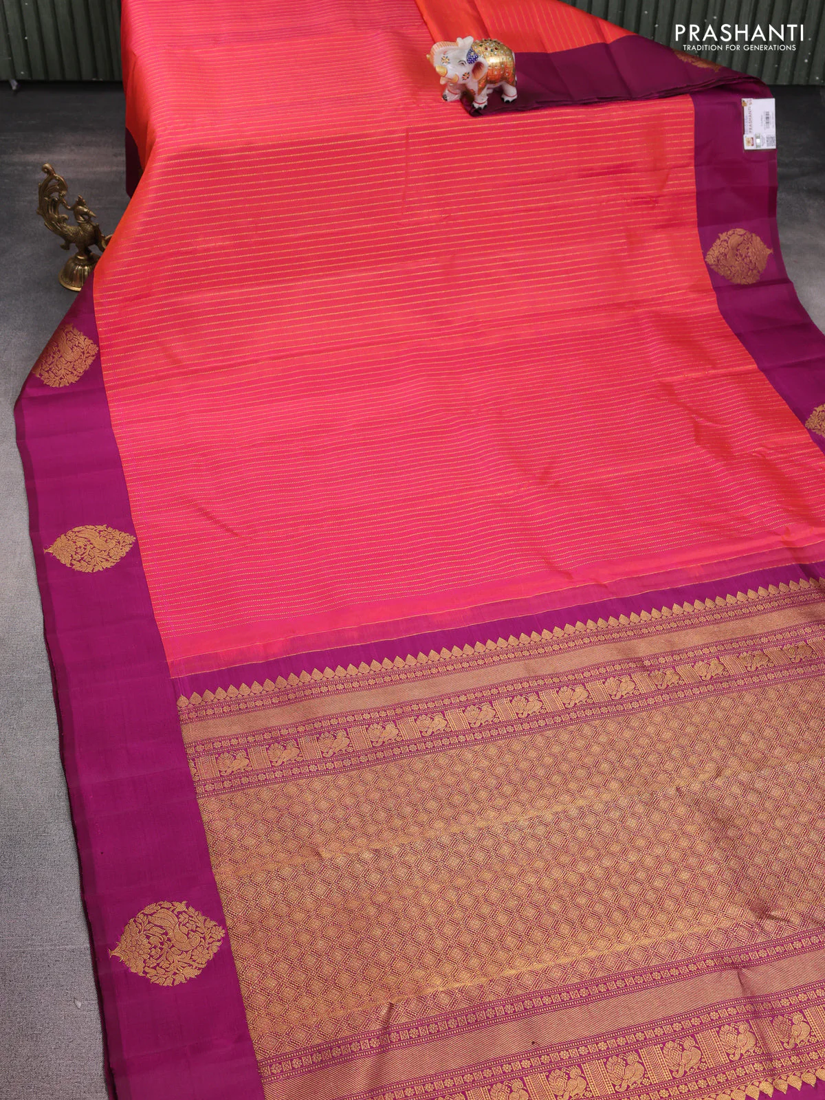 Pure kanchipuram silk saree dual shade of pinkish orange and magenta pink with allover zari woven stripes pattern and zari woven butta border - Image 2