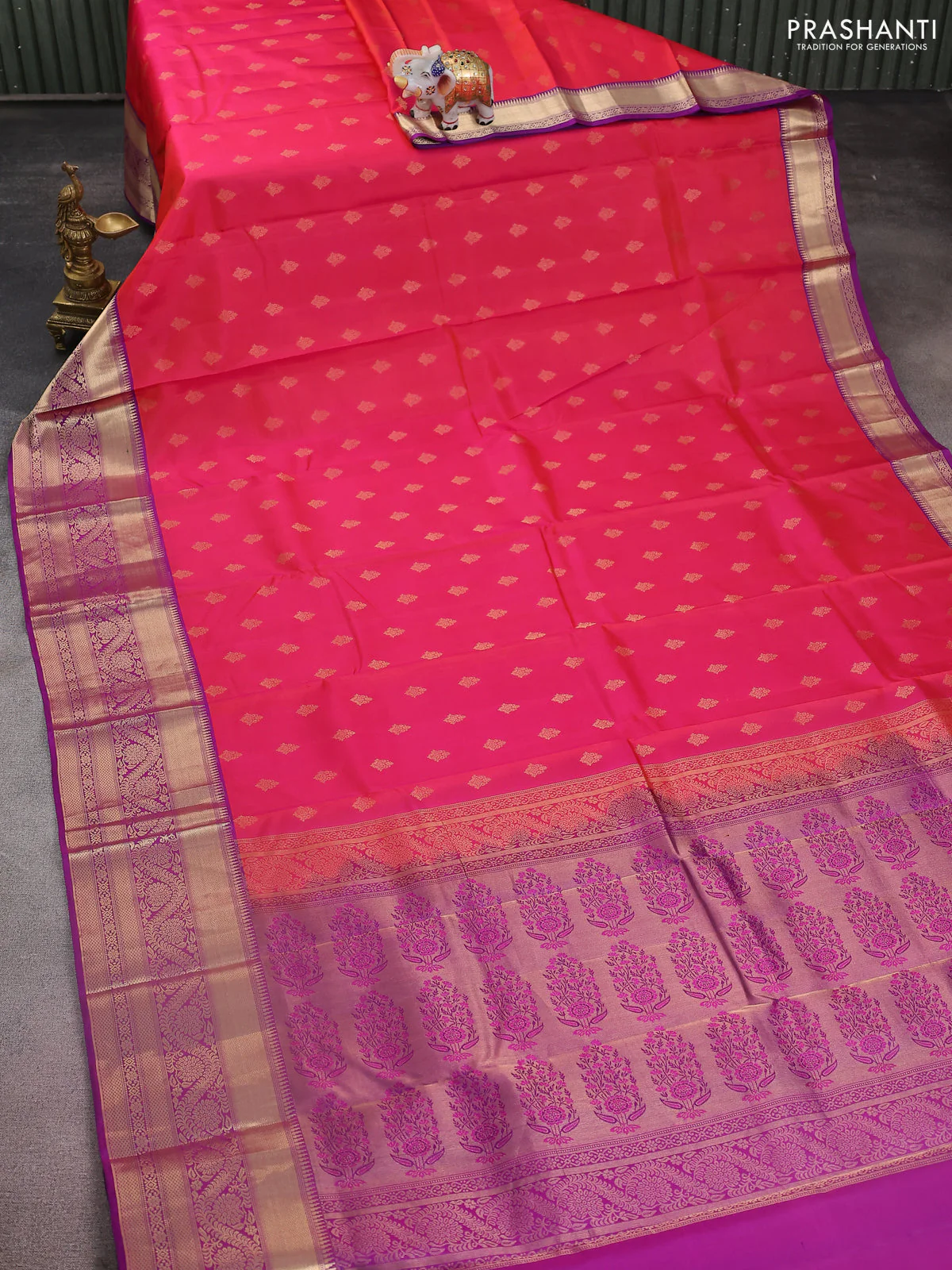 Pure kanchipuram silk saree dual shade of pinkish orange and purple with allover zari woven buttas and rich zari woven border - Image 2