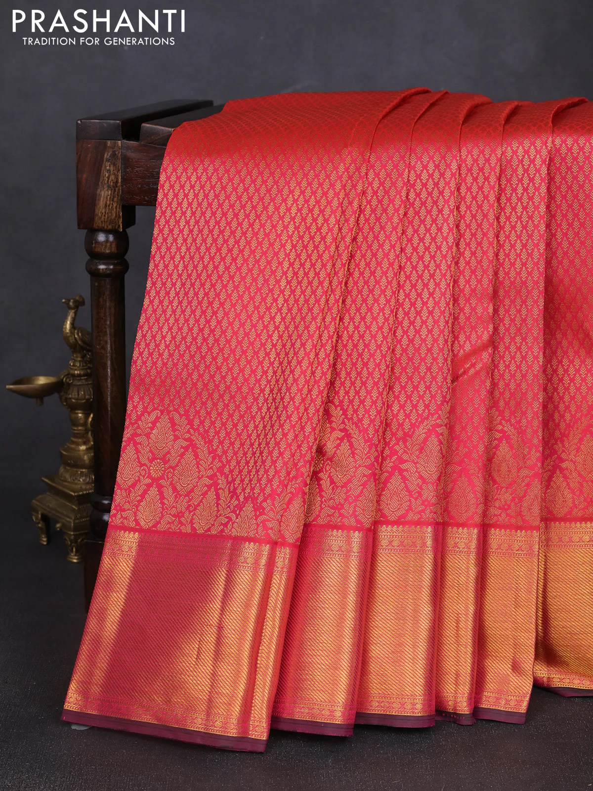 Pure kanchipuram silk saree dual shade of pinkish orange with allover zari woven brocade weaves and rich zari woven border