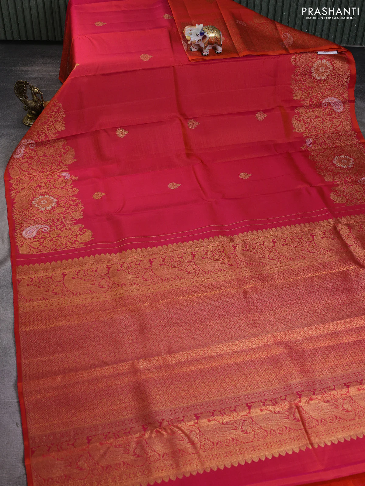 Pure kanchipuram silk saree dual shade of pinkish orange with zari woven buttas and long zari woven border - Image 2