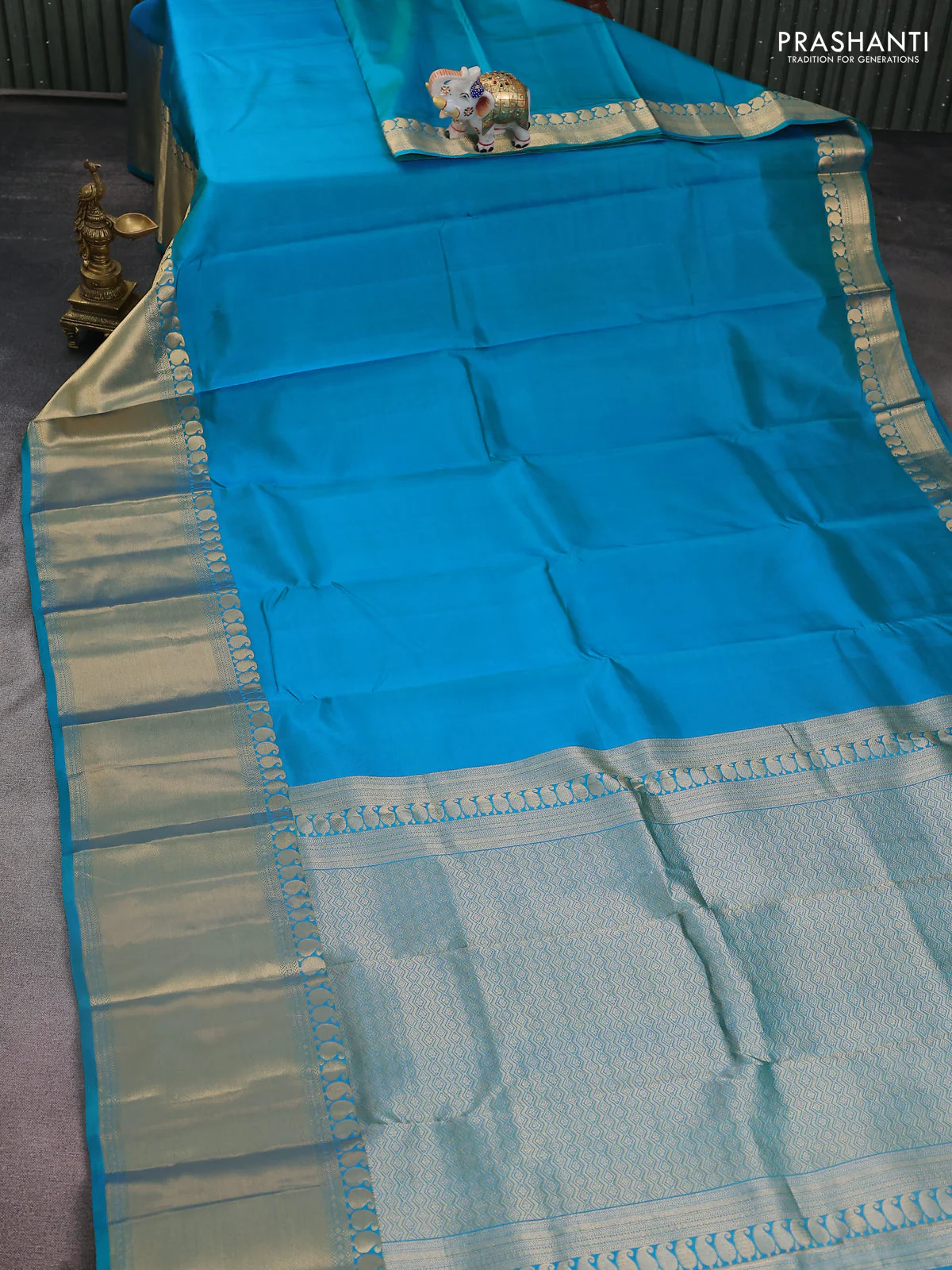 Pure kanchipuram silk saree dual shade of teal blue with plain body and long zari woven border - Image 2