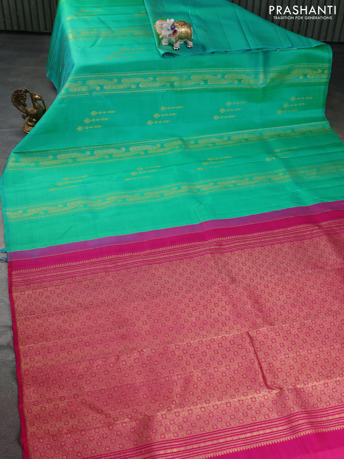 Pure kanchipuram silk saree dual shade of teal bluish green and pink with allover zariw weaves & buttas in borderless style - Image 2