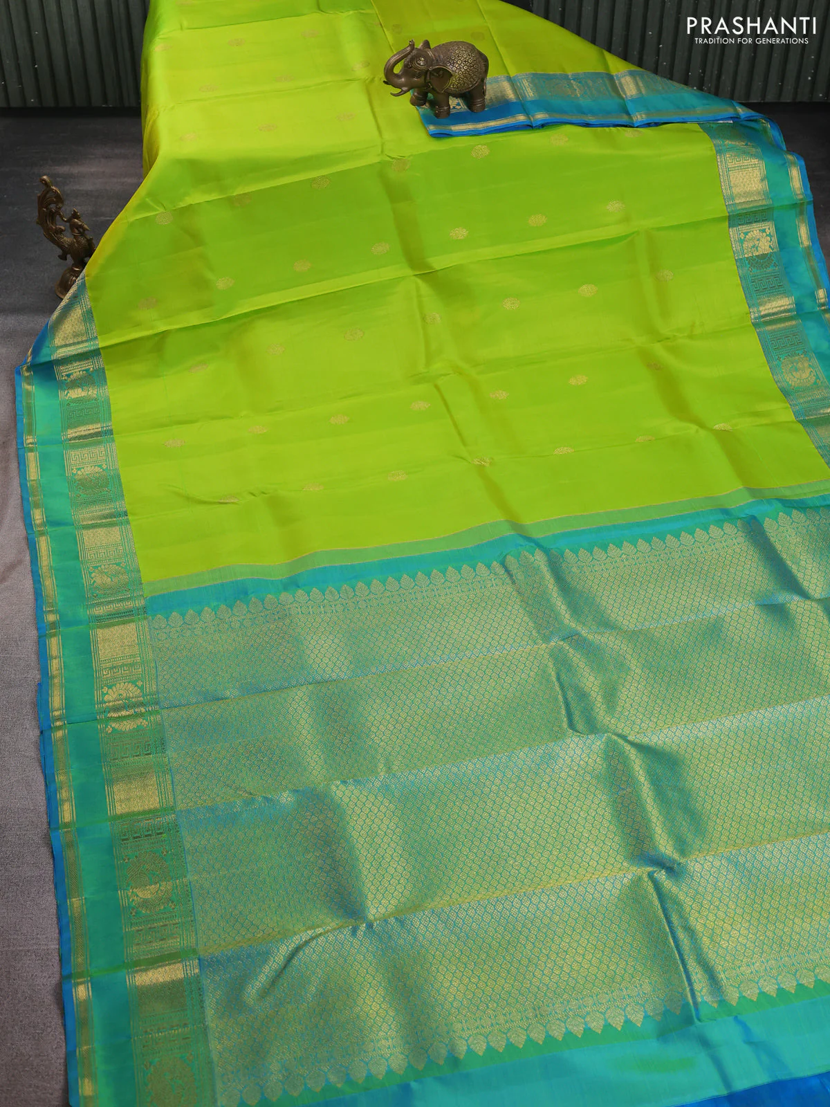 Pure kanchipuram silk saree fluorscent green and dual shade of cs blue with zari woven buttas and rettapet zari woven border - Image 2