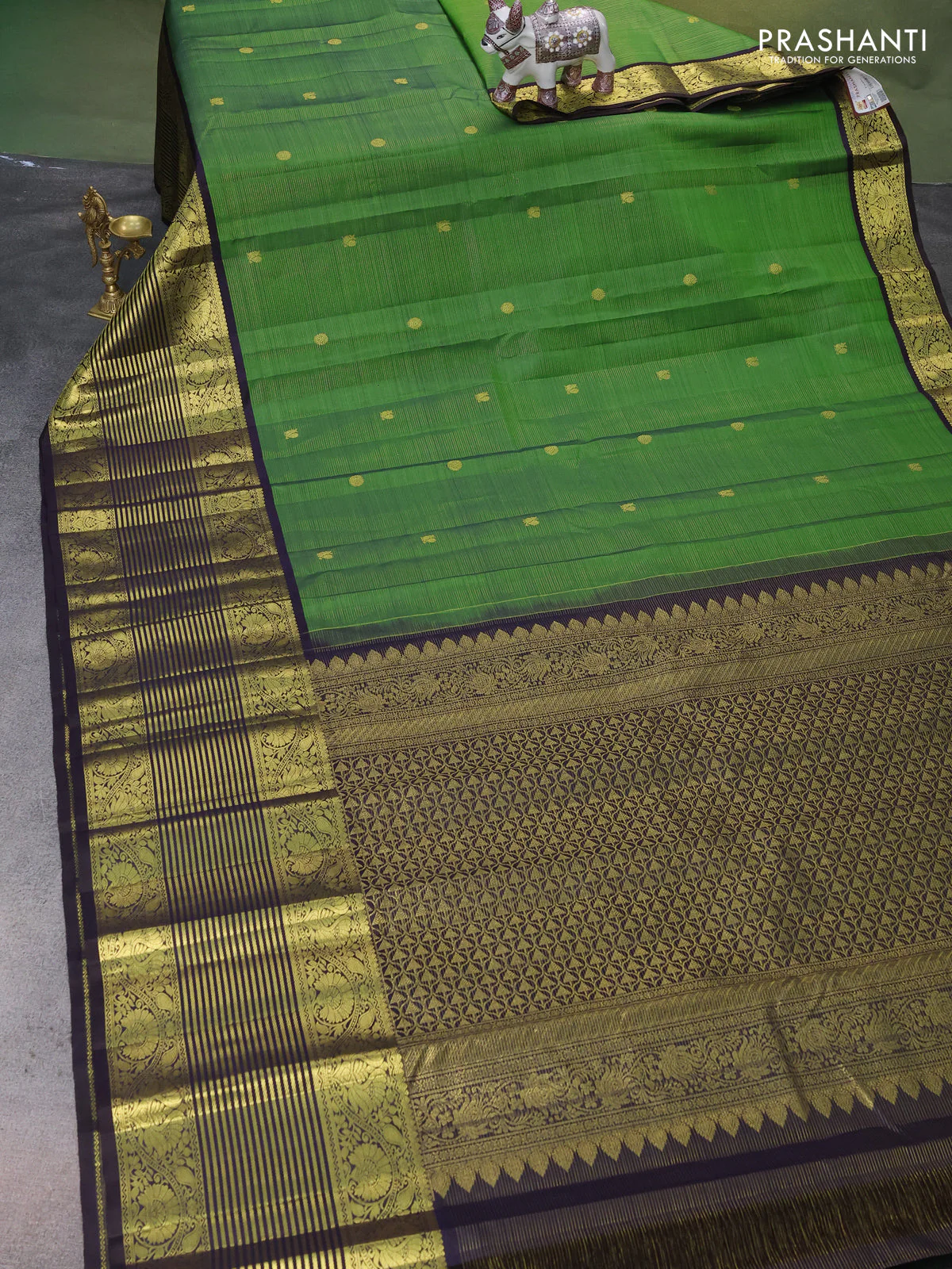 Pure kanchipuram silk saree green and coffee brown with allover zari woven strip pattern and long rich zari woven border - Image 2