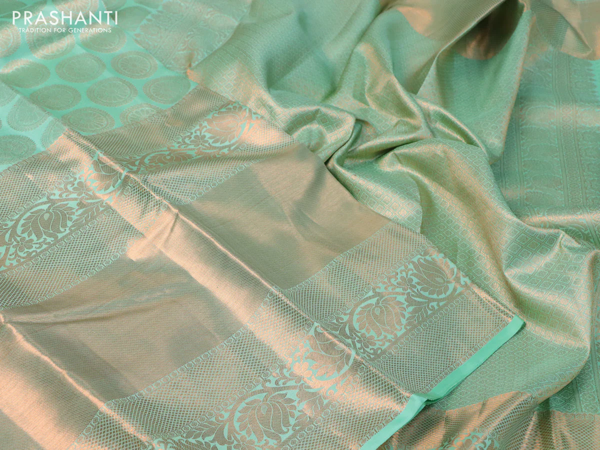 Pure kanchipuram silk saree green shade with allover zari woven butta weaves and long rich zari woven border - Image 3