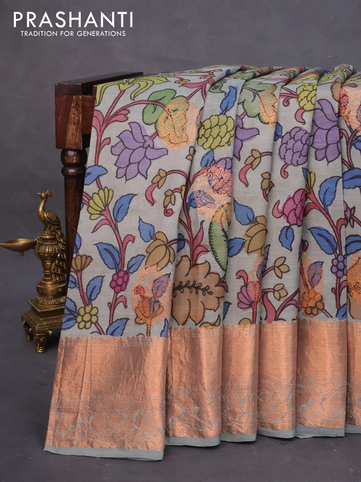 Pure kanchipuram silk saree grey shade with allover pen kalamkari prints & zari buttas and copper zari woven border