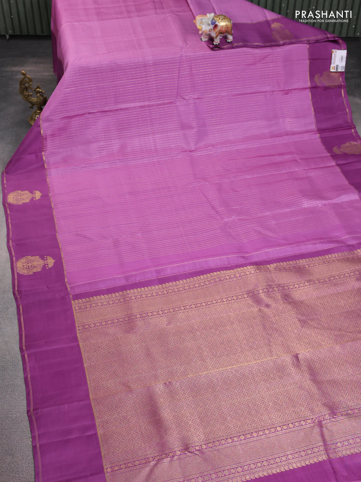 Pure kanchipuram silk saree lavender and purple shade with allover zari woven stripes pattern and zari woven butta border - Image 2