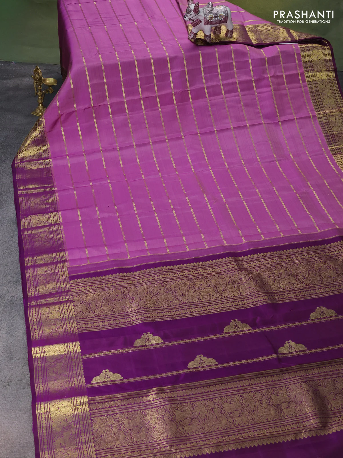 Pure kanchipuram silk saree lavender and purple with allover zari woven strip pattern and rich zari woven border - Image 2