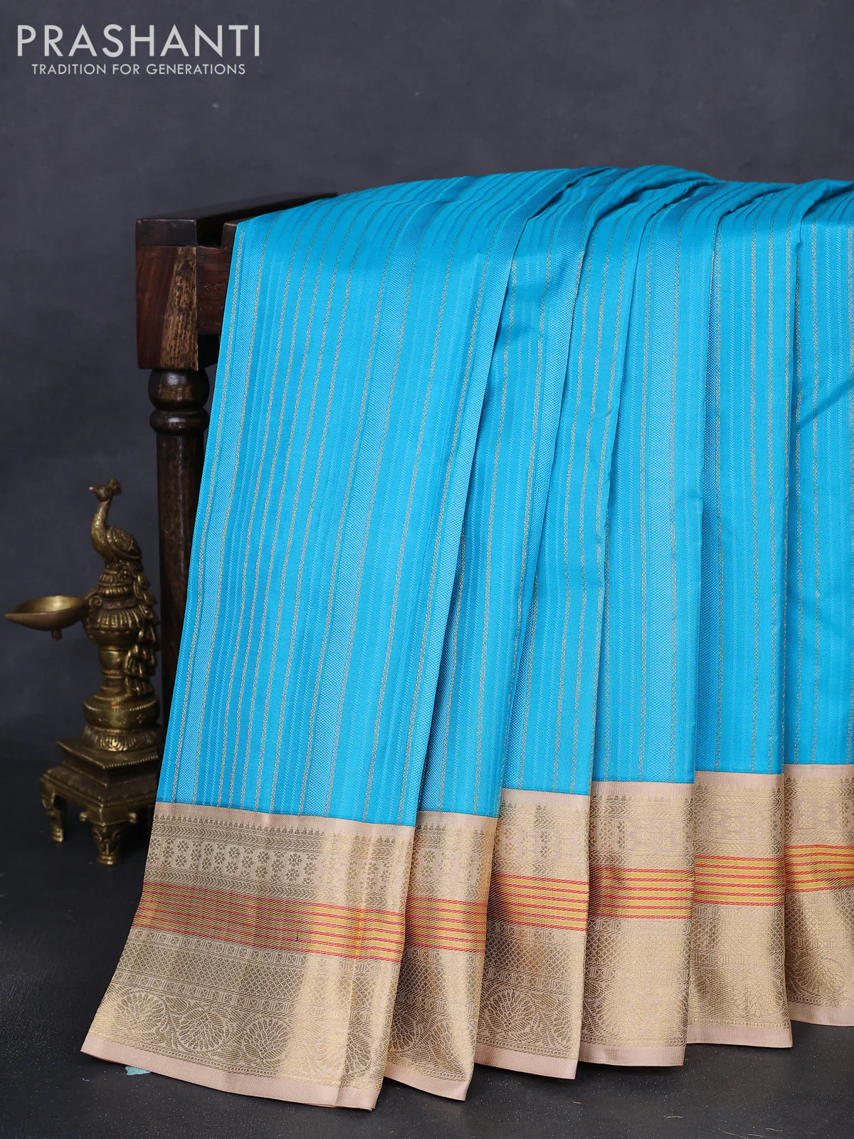Pure kanchipuram silk saree light blue and sandal with allover self emboss & zari weaves and zari woven korvai border
