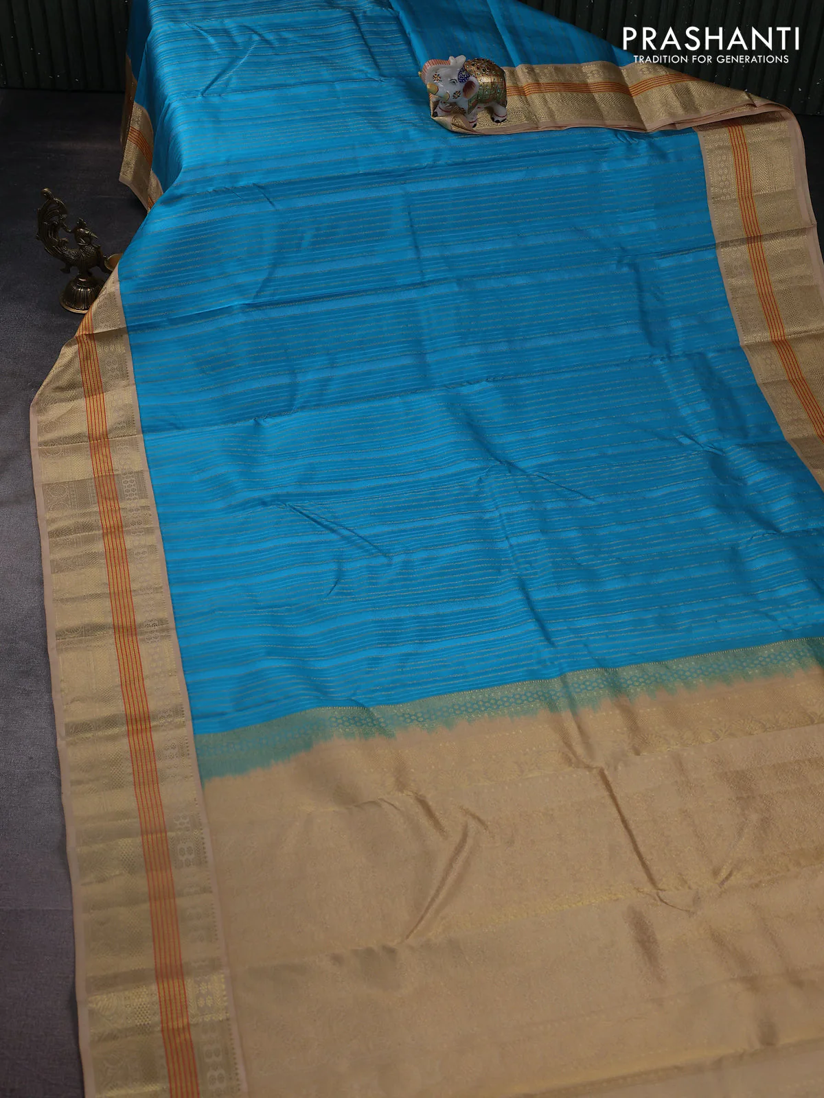 Pure kanchipuram silk saree light blue and sandal with allover self emboss & zari weaves and zari woven korvai border - Image 2