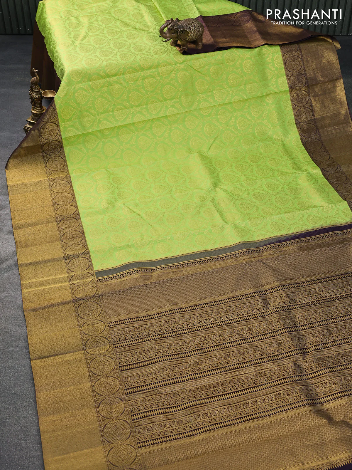 Pure kanchipuram silk saree light green and deep jamun shade with allover zari woven brocade weaves and long zari woven border - Image 2