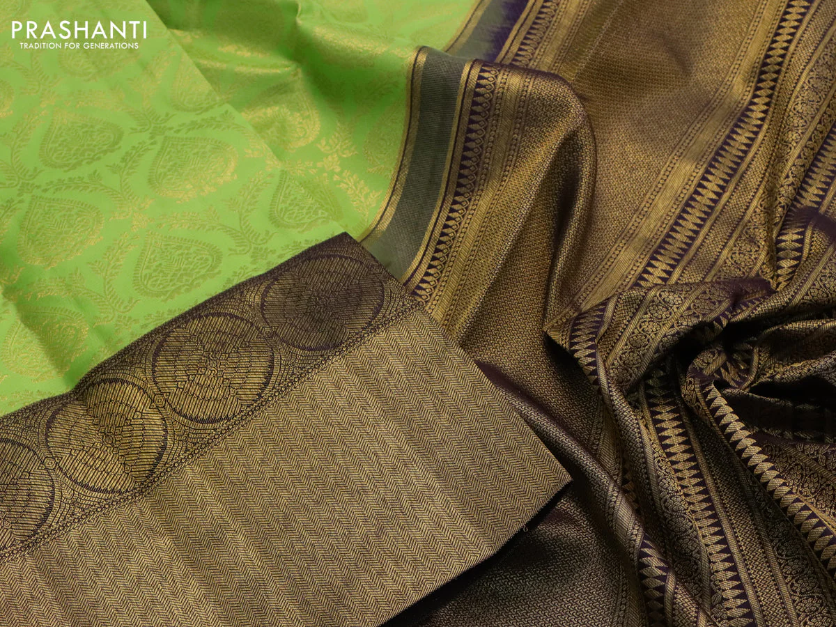 Pure kanchipuram silk saree light green and deep jamun shade with allover zari woven brocade weaves and long zari woven border - Image 3