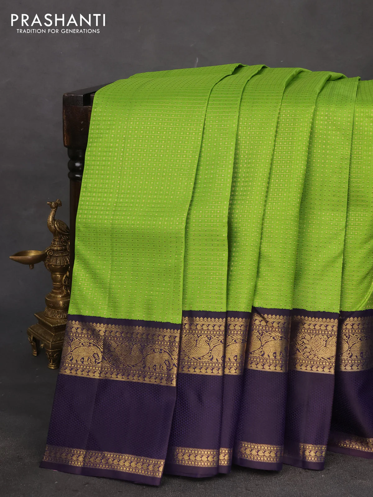 Pure kanchipuram silk saree light green and deep jamun with allover zari woven lakshadeepam pattern and rich zari woven simple border - Image 2