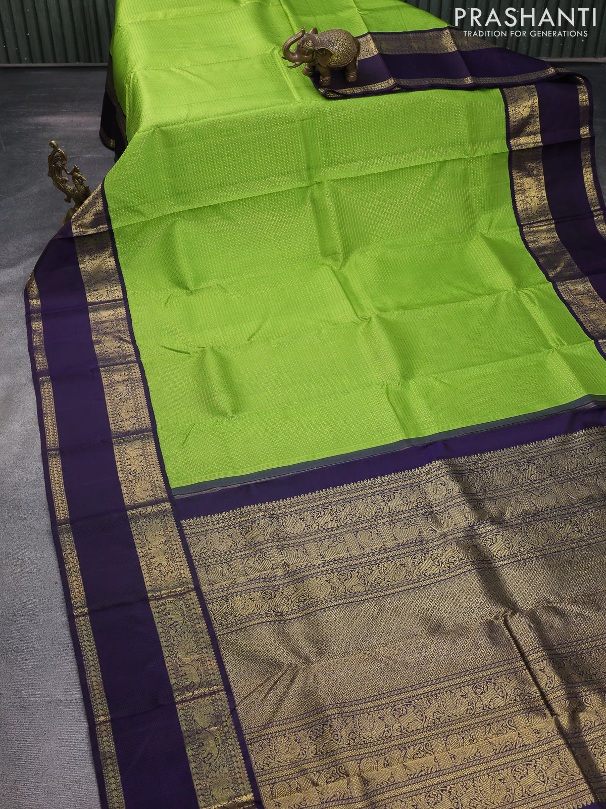 Pure kanchipuram silk saree light green and deep jamun with allover zari woven lakshadeepam pattern and rich zari woven simple border - Image 3