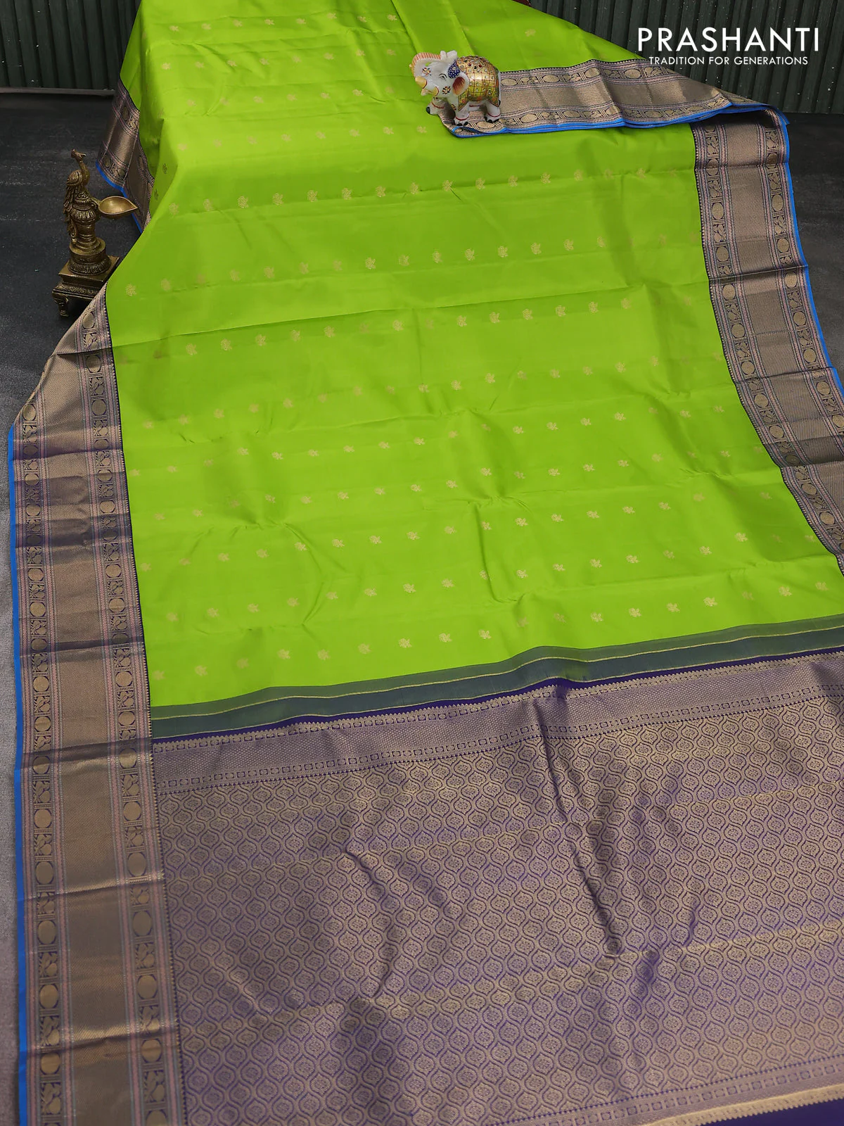 Pure kanchipuram silk saree light green and navy blue with zari woven buttas and zari woven border - Image 2