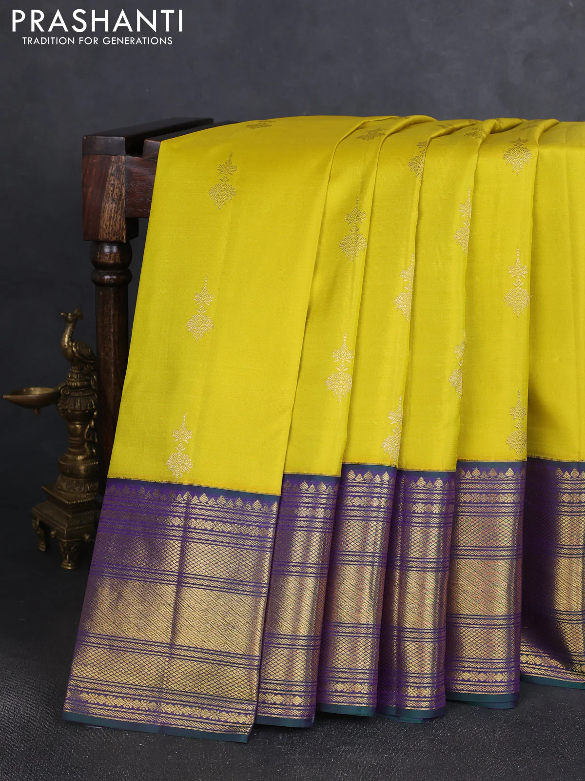 Pure kanchipuram silk saree lime yellow and dual shade of greenish violet with zari woven buttas and rich zari woven korvai border