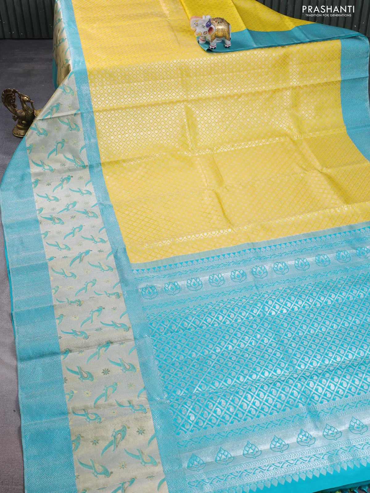 Pure kanchipuram silk saree lime yellow and teal blue with allover silver zari brocade weaves and long rich silver woven border - Image 2