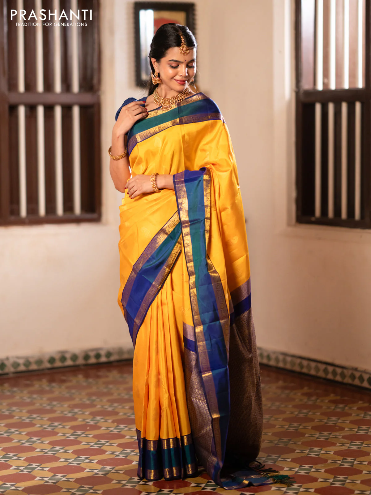 Pure kanchipuram silk saree mango yellow and blue with paisley zari woven buttas and rettapet zari woven border - Image 2