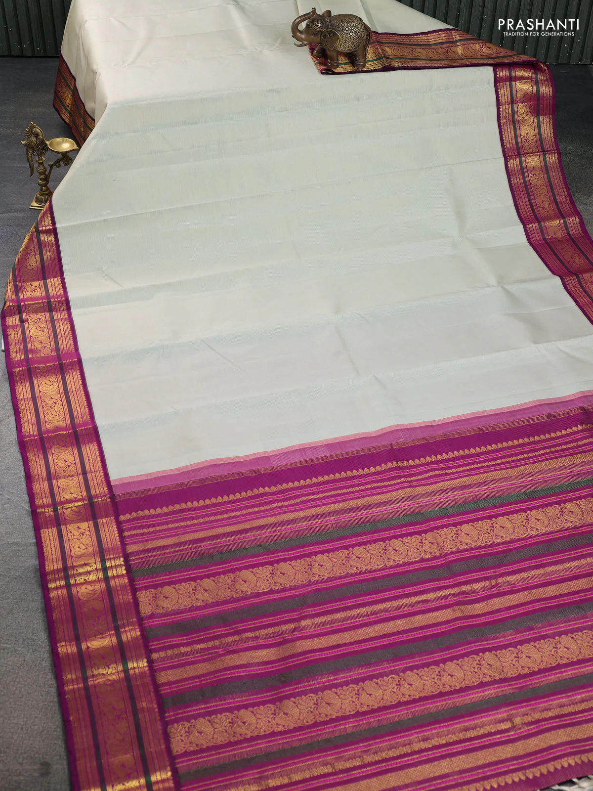 Pure kanchipuram silk saree mild pista green and purple with allover zari woven stripe pattern and zari woven korvai border - Image 2