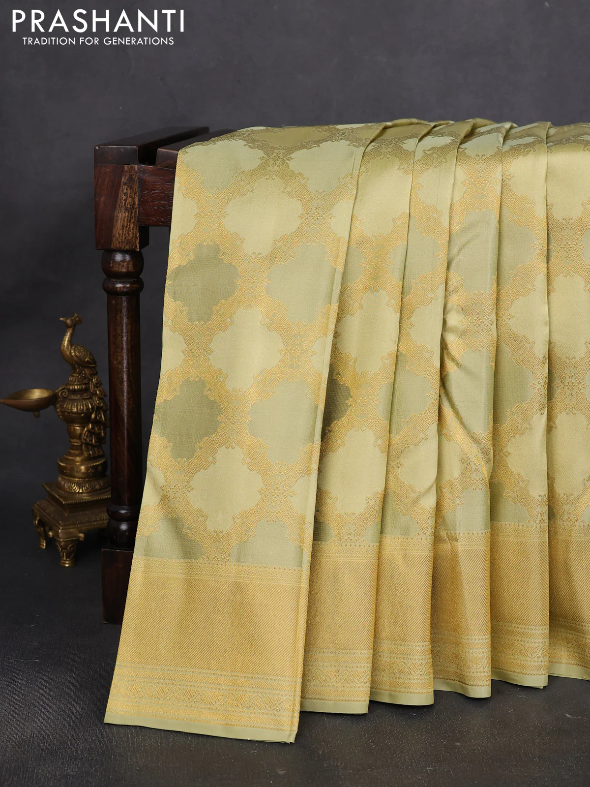 Pure kanchipuram silk saree mild pista green with allover zari weaves and rich zari woven border - Image 2
