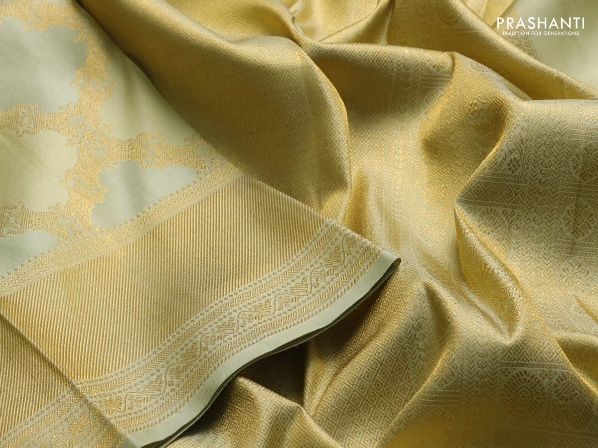 Pure kanchipuram silk saree mild pista green with allover zari weaves and rich zari woven border - Image 4