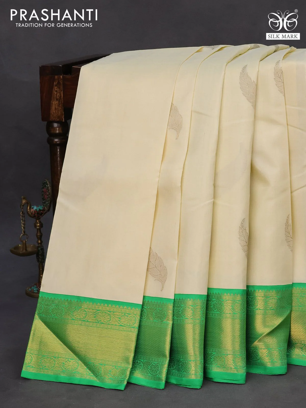 Pure kanchipuram silk saree off white and green with zari woven leaf buttas and zari woven border - Image 2