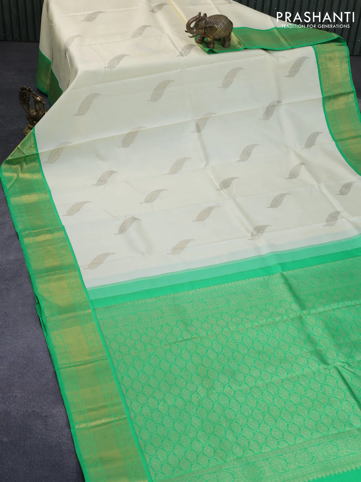 Pure kanchipuram silk saree off white and green with zari woven leaf buttas and zari woven border - Image 3
