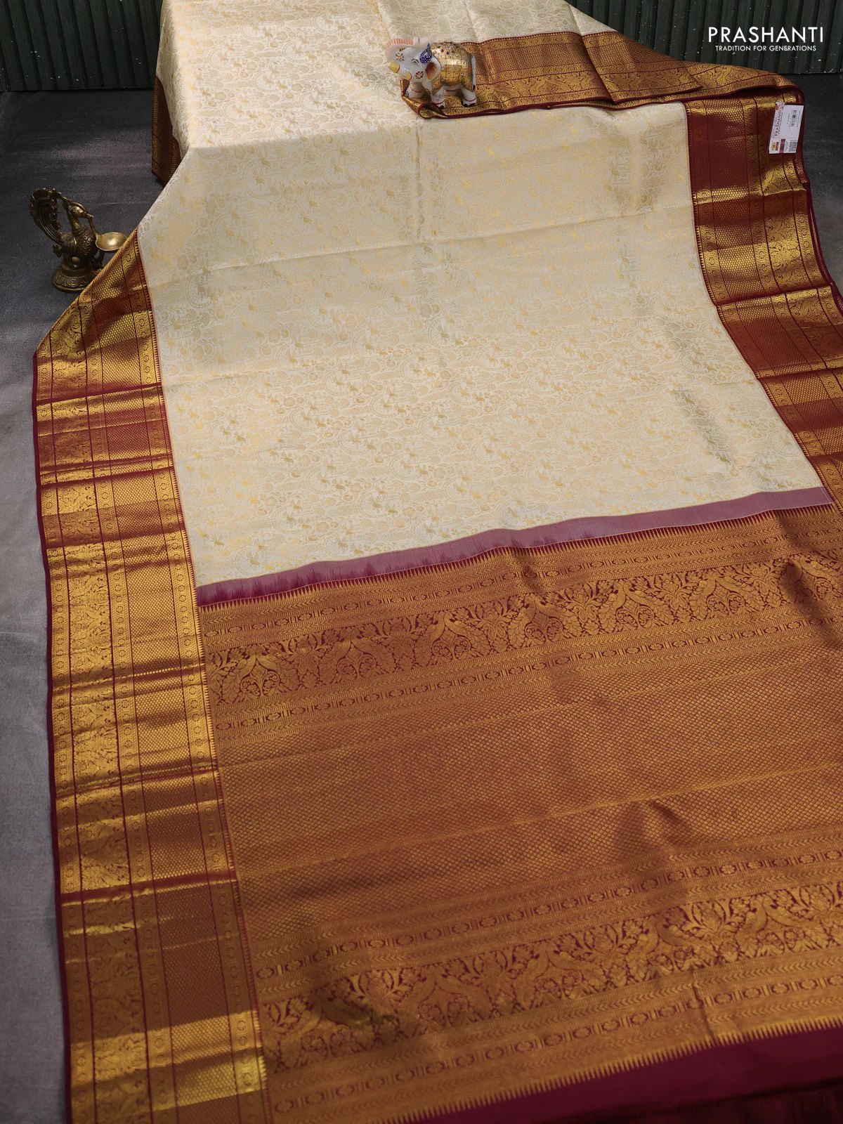 Pure kanchipuram silk saree off white and maroon with allover zari woven brocade weaves and zari woven border - Image 2