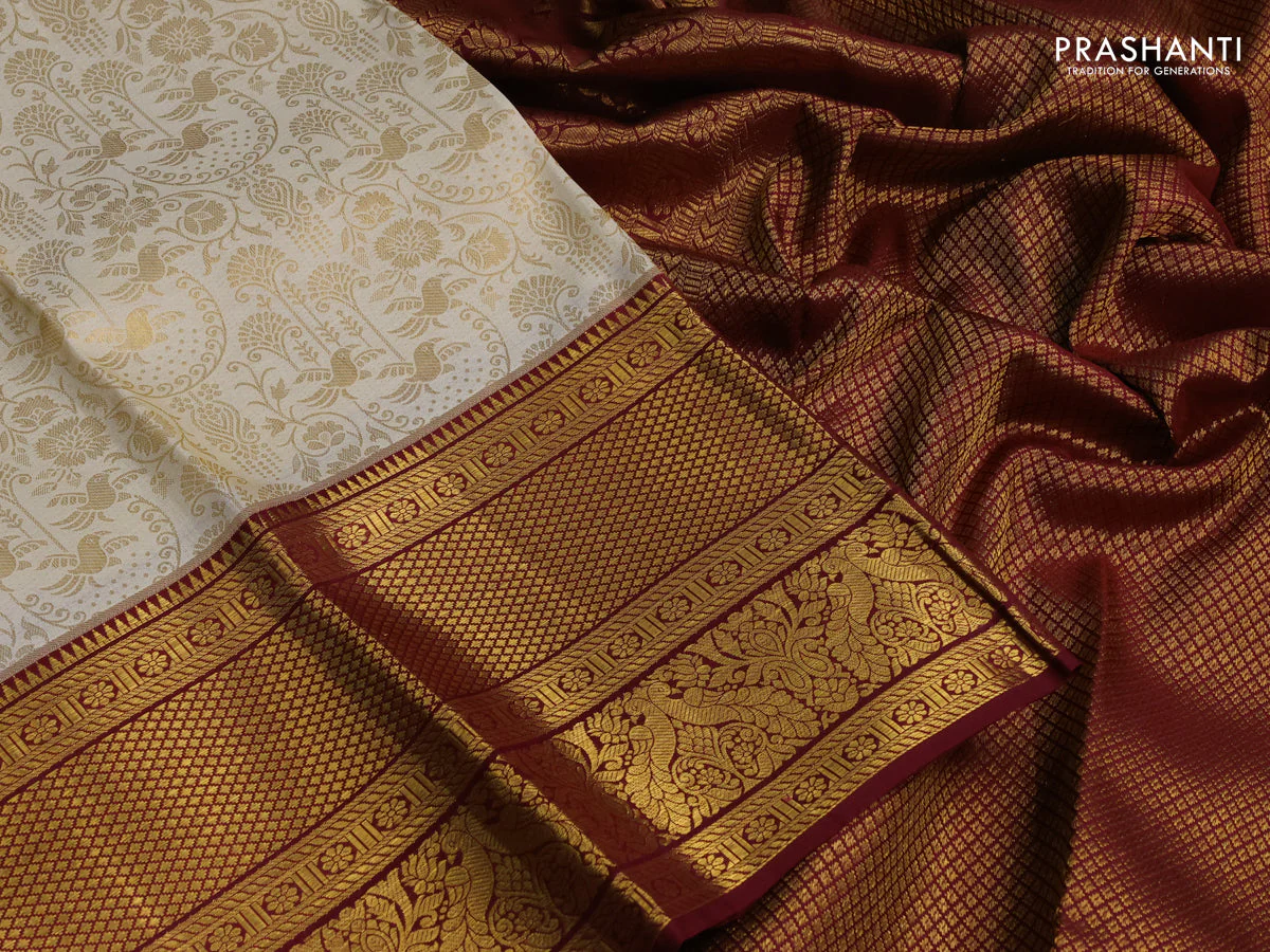 Pure kanchipuram silk saree off white and maroon with allover zari woven brocade weaves and zari woven border - Image 3