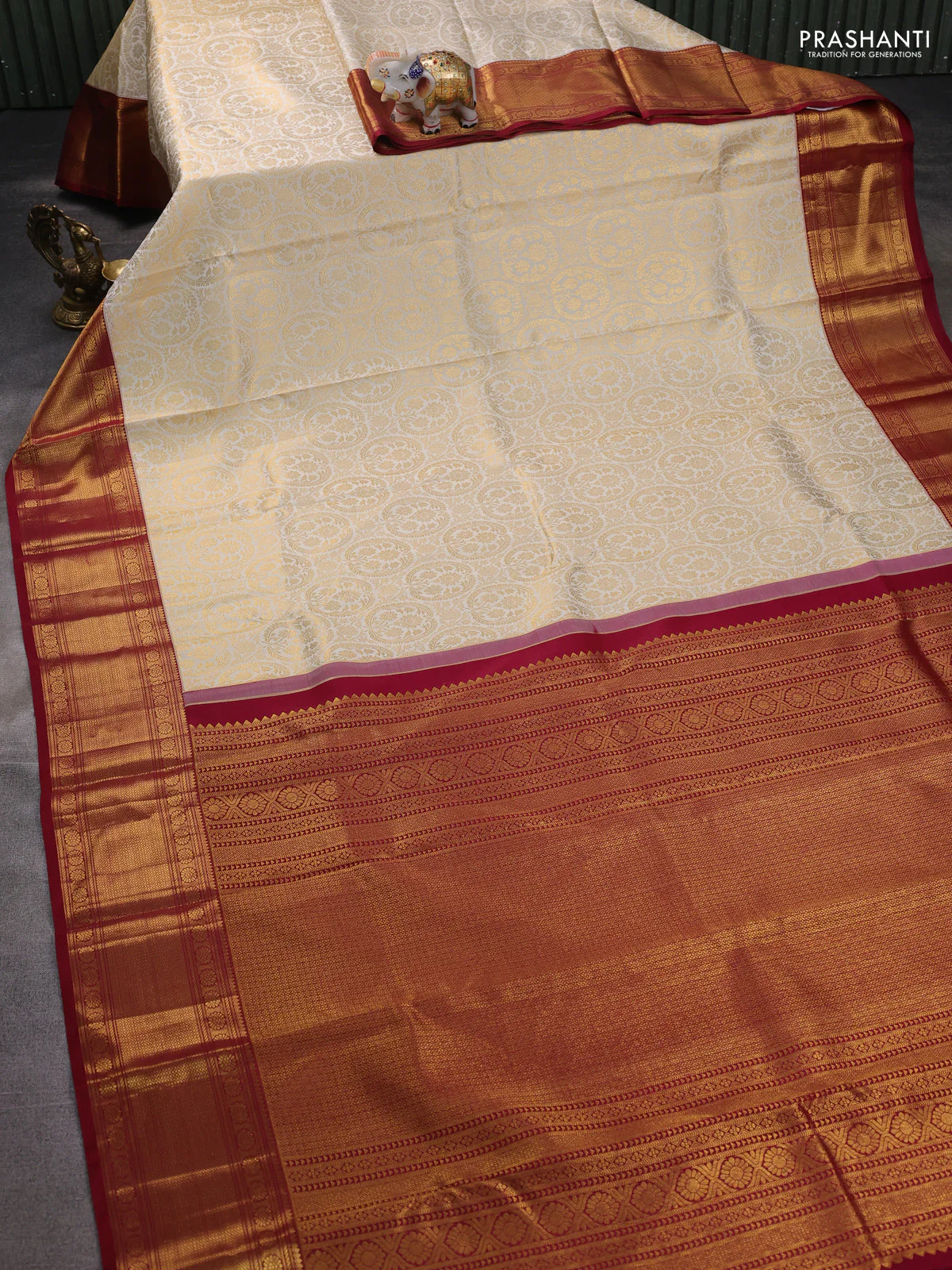 Pure kanchipuram silk saree off white and maroon with allover zari woven brocade weaves and zari woven border - Image 2