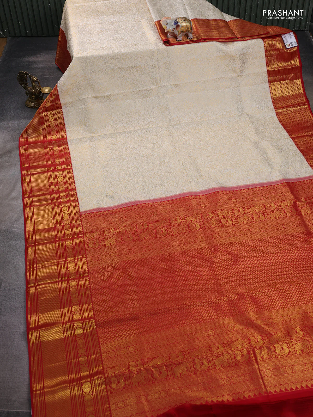 Pure kanchipuram silk saree off white and red with allover zari woven brocade weaves and zari woven border - Image 2