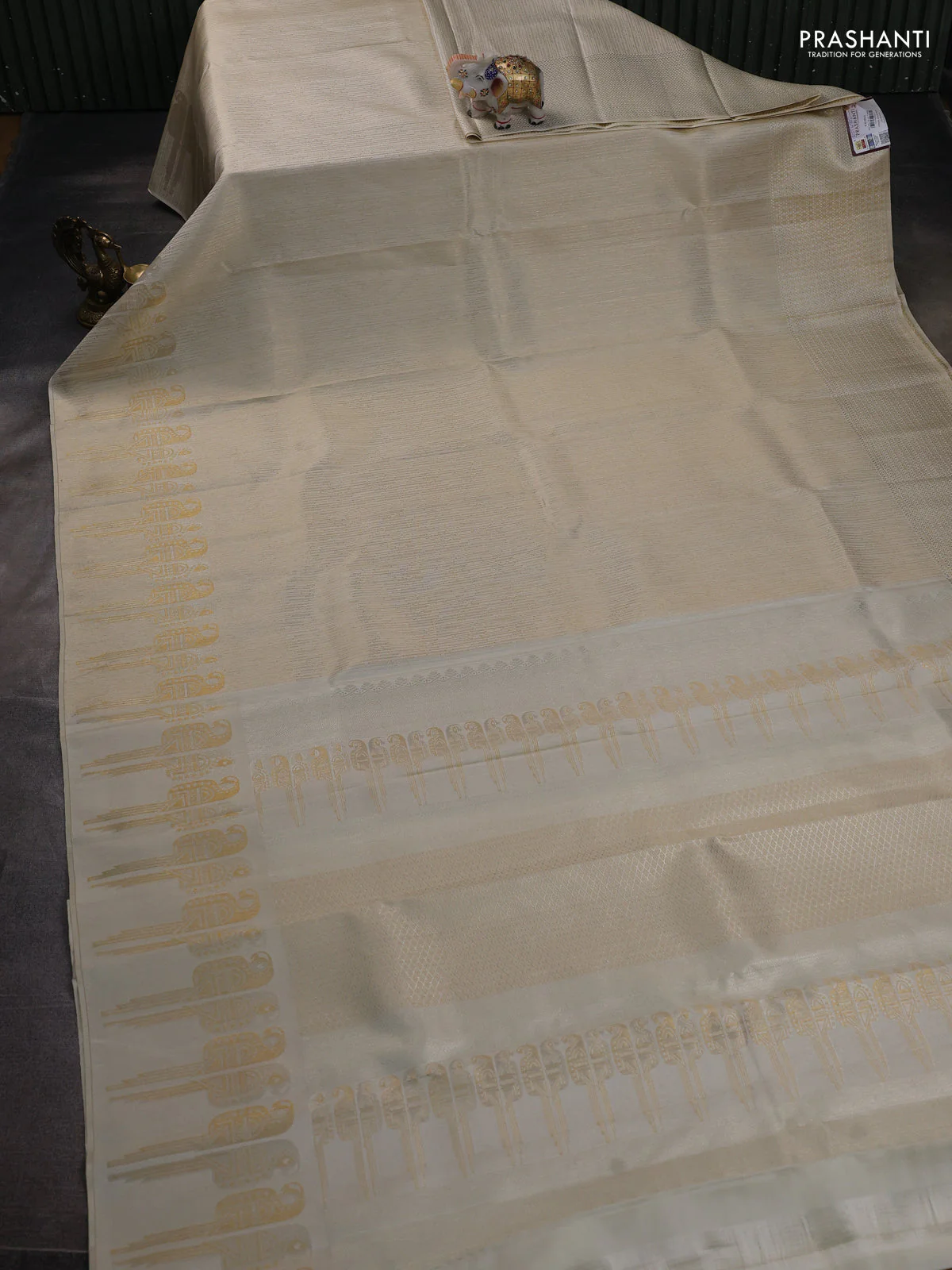 Pure kanchipuram silk saree off white with allover zari woven brocade weaves and zari woven border - Image 2
