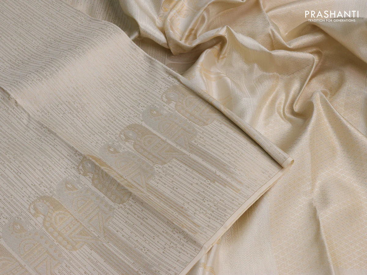 Pure kanchipuram silk saree off white with allover zari woven brocade weaves and zari woven border - Image 3