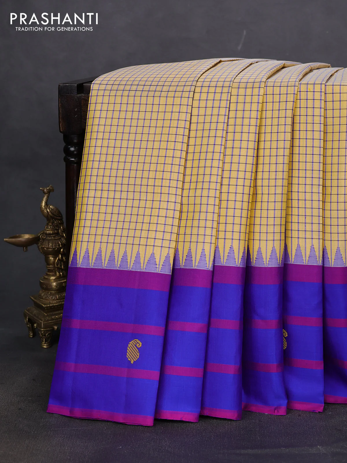 Pure kanchipuram silk saree pale yellow and blue with allover small checked pattern and temple design thread woven butta border