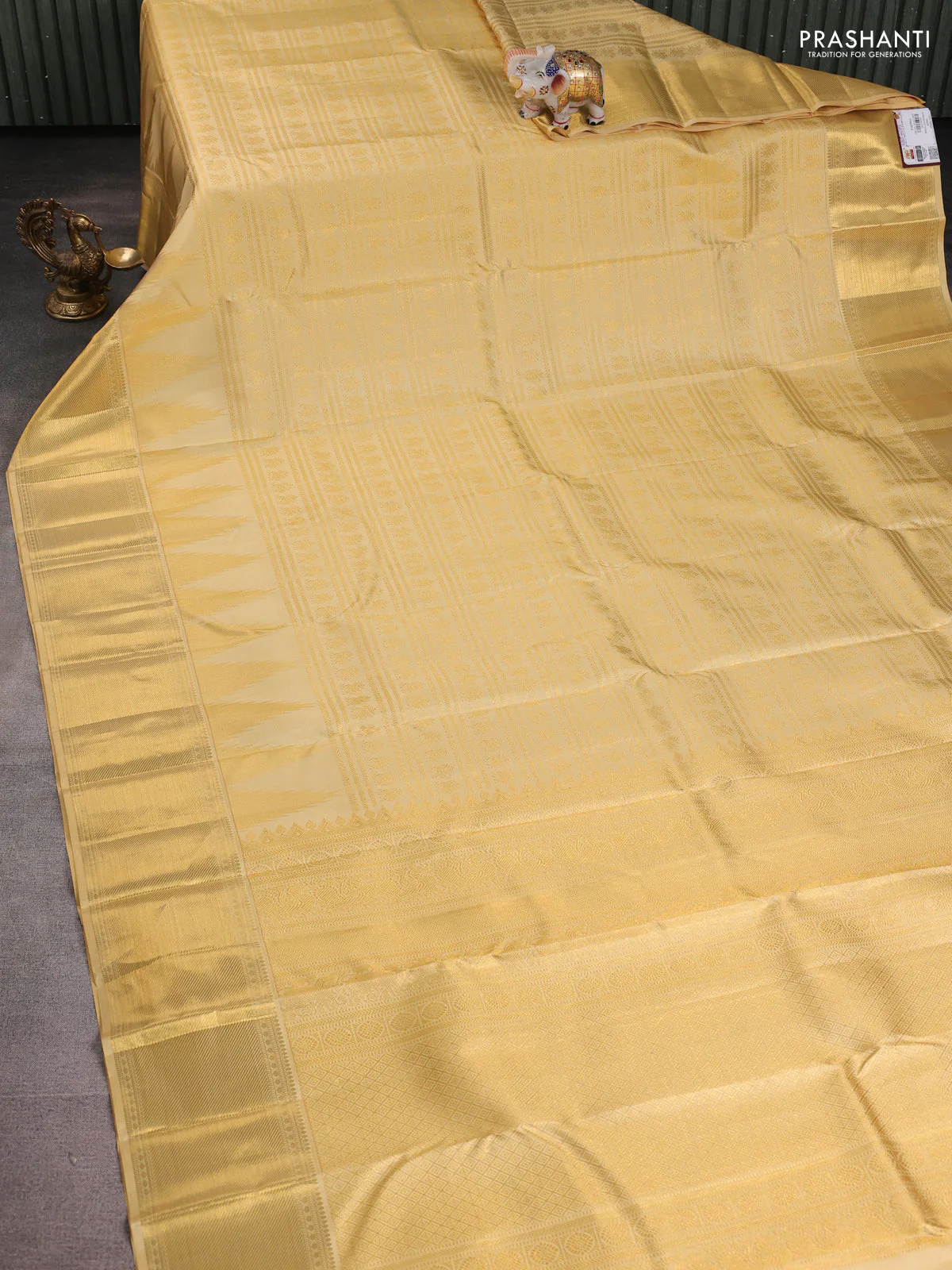 Pure kanchipuram silk saree pale yellow shade with allover zari woven brocade weaves and long temple design zari woven border - Image 2