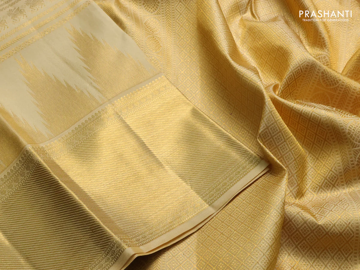 Pure kanchipuram silk saree pale yellow shade with allover zari woven brocade weaves and long temple design zari woven border - Image 3