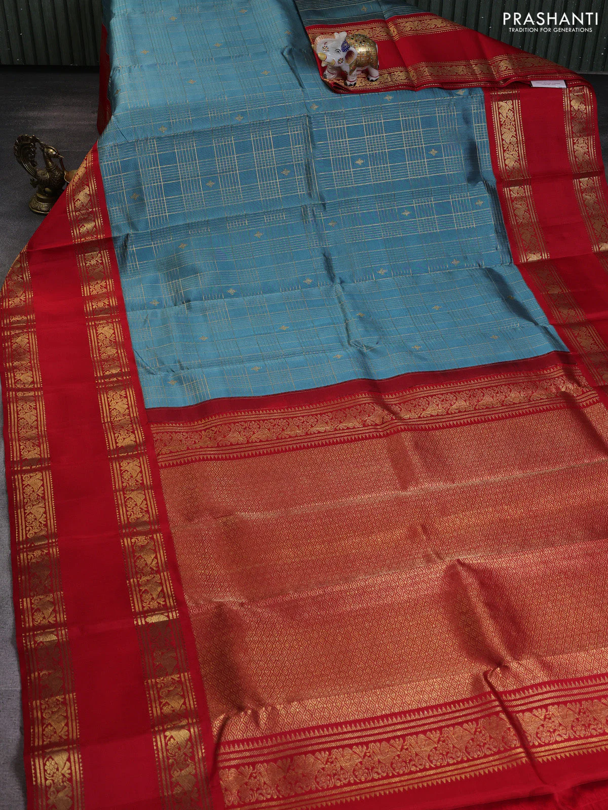 Pure kanchipuram silk saree pastel blue shade and red with allover zari checks & buttas and long zari woven border - Image 2