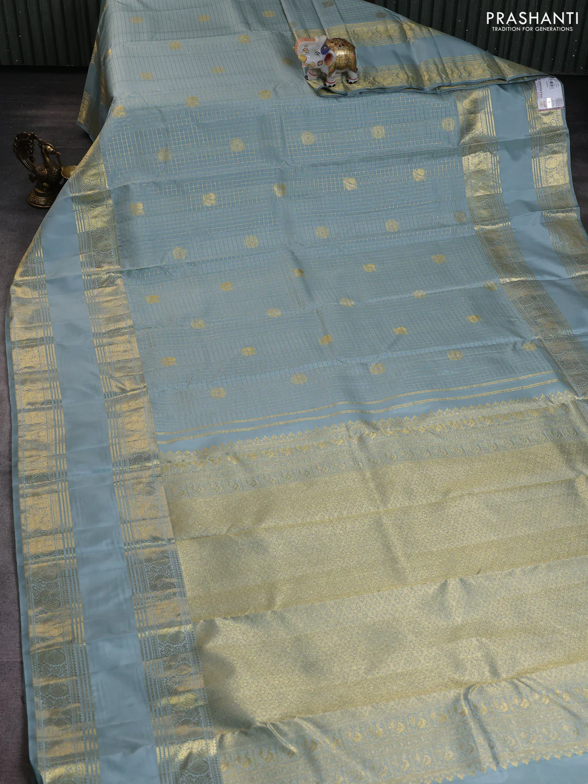 Pure kanchipuram silk saree pastel blue shade with allover zari woven checked pattern and long rettapet zari woven border - Image 2